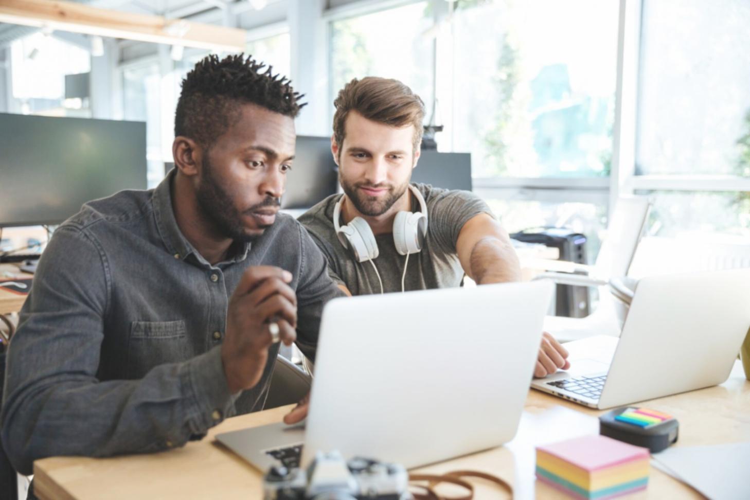 Network infrastructure monitoring setup showing server racks and monitoring equipment